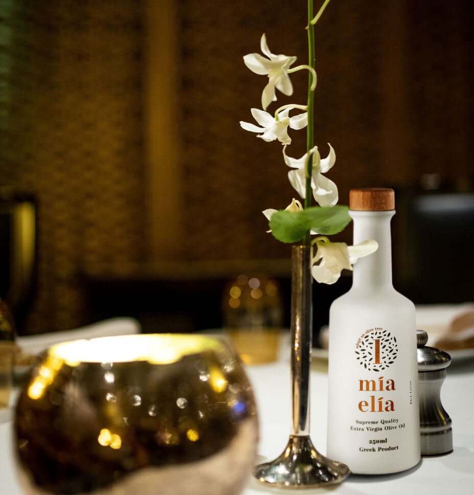 bottle of olive oil on table